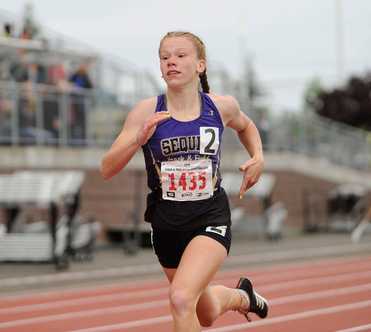 Sequims Riley Pyeatt races in the preliminaries of the 200 meters at the Class 2A state track and field championships in Tacoma in May 2019. Pyeatt placed fifth in the 400-meter race. (Michael Dashiell/Olympic Peninsula News Group file)
