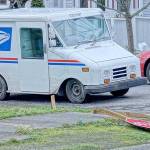 Wind snapped a stop sign post at Lawrence and Van Buren streets on Wednesday in Uptown Port Townsend. The powerful gusts knocked power out for nearly 1,000 Jefferson Public Utility District customers throughout the morning. (Diane Urbani de la Paz/Peninsula Daily News)