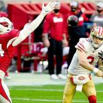 San Francisco 49ers quarterback C.J. Beathard (3) passes as Arizona Cardinals defensive end Zach Allen (94) rushes on Dec. 26 in Glendale, Ariz. Beathard is expected to start today against the Seattle Seahawks. (AP Photo/Rick Scuteri)