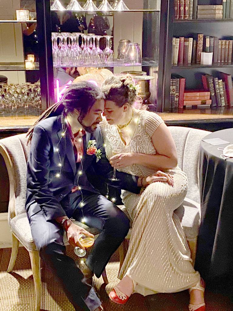 Jefferson County Commissioner Kate Dean of Port Townsend and architect Rico Quirindongo of Bainbridge Island ducked inside for a moment during their wedding day at the Sorrento Hotel in Seattle. (Submitted photo)