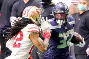 Seattle Seahawks running back Chris Carson (32) during an NFL football game against the San Francisco 49ers, Sunday, Jan. 3, 2021, in Glendale, Ariz. (AP Photo/Rick Scuteri)