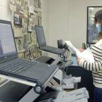 Keith Thorpe/Peninsula Daily News
Clallam County Elections Supervisor Susan Johnson leafs through a stack of test ballots during a logic and accuracy test of the county's two ballot scanners on Wednesday at the Clallam County Courthouse in Port Angeles. The test, performed before every election, showed that the scanners came up with the expected results and passed certification.