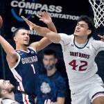 Gonzaga guard Jalen Suggs (1) shoots against Saint Marys forward Dan Fotu (42) during the second half of an NCAA college basketball game in Moraga, Calif., Saturday, Jan. 16, 2021. (AP Photo/Jeff Chiu)