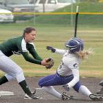 Sequims Greta Christianson, center, attempts to reach second as Port Angeles Jada Cargo waits to make the tag while umpire Scott Ramsey looks on in a May 2019 playoff game at Billy Whiteshoes Memorial Park west of Port Angeles. (Keith Thorpe/Peninsula Daily News)
Sequims Greta Christianson, center, attempts to reach second as Port Angeles Jada Cargo waits to make the tag while umpire Scott Ramsey looks on in the second inning of a May 2019 playoff game at Billy Whiteshoes Memorial Park west of Port Angeles. (Keith Thorpe/Peninsula Daily News)
