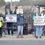More than 100 community members rallied at the corners of Washington Street and Sequim Avenue on Monday afternoon holding signs to support Sequim City Manager Charlie Bush. The Sequim City Council was set to vote Monday night on Bushs severance package after a majority of council members voted to call for his resignation on Jan. 11. Members of the group Sequim Good Governance League submitted a petition with 1,239 signatures asking to retain Bush to the city council with more than 680 people designating their city as Sequim, including at least four former Sequim city council members. (Matthew Nash/Olympic Peninsula News Group)