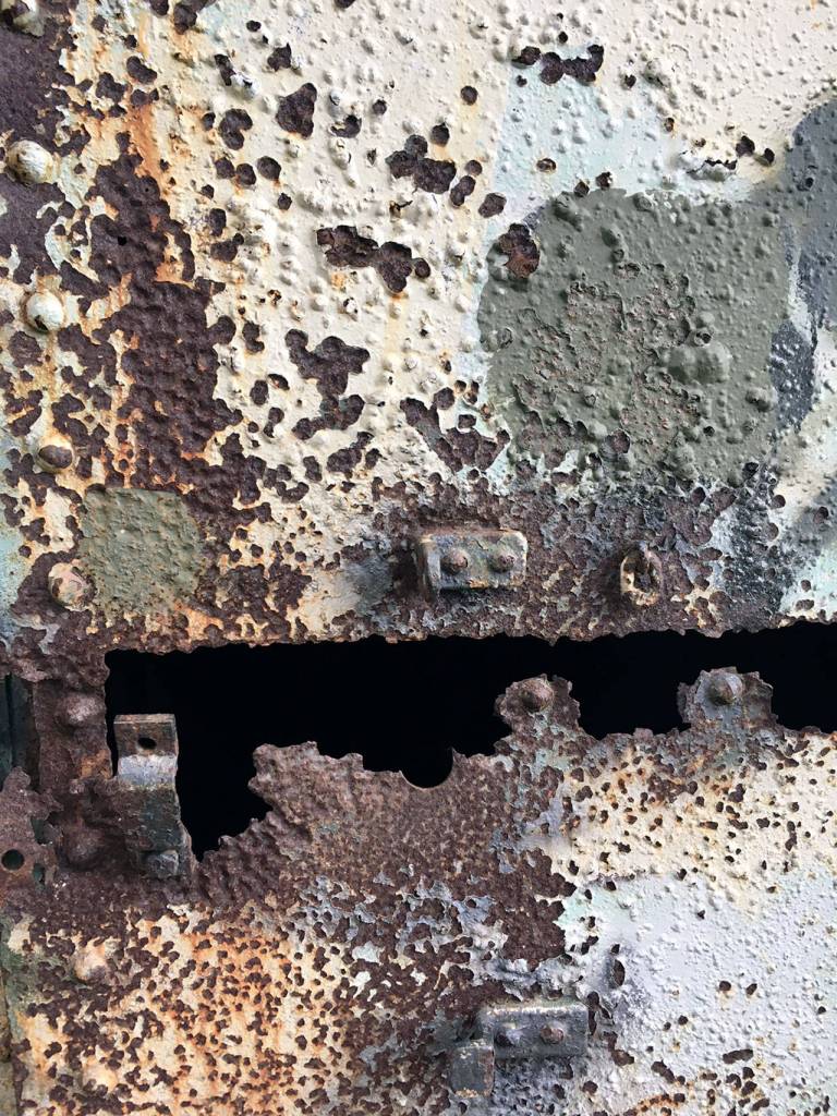 Rusted Rainbow, a photograph by Pamela Raine, will be in the Eye of the Beholder Group Show.