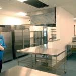 Janet Gray, resource development director for the Boys & Girls Clubs of the Olympic Peninsula, stands in the kitchen of the organizations new clubhouse in Port Angeles on Thursday. (Keith Thorpe/Peninsula Daily News)