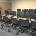 Boys & Girls Club board member Norma Turner, left, and Resource Development Director Janet Gray look over equipment the new computer room of the Port Angeles clubhouse. (Keith Thorpe/Peninsula Daily News)