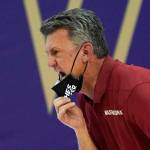 Washington State head coach Kyle Smith pulls down his mask to yell toward the court in the first half of an NCAA college basketball game against Washington, Sunday, Jan. 31, 2021, in Seattle. (AP Photo/Elaine Thompson)