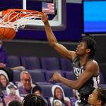 Washington States Efe Abogidi dunks against Washington in the first half of an NCAA college basketball game Sunday, Jan. 31, 2021, in Seattle. (AP Photo/Elaine Thompson)