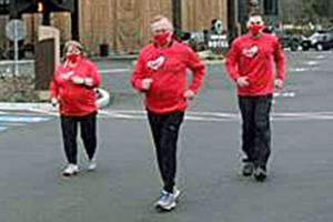 Red, Set, Go Race and Heart Luncheon officials embark on a training run/walk on Saturday at Seven Cedars Casino and Hotel. From left are Loni Greninger, Jamestown Tribal Council; Victoria Jones, race director of the Red, Set, Go Heart Healthy Run/Walk/Swim; Lori Frederick, vice president of Strait View Credit Union, the presenting sponsor of the race; Karen Rogers, chair of the Red, Set, Go Luncheon; Bruce Skinner, OMC Foundation executive director; Darryl Wolfe, Olympic Medical Center CEO; and OMC Commissioner Jean Hordyk. (Courtesy of OMC Foundation)