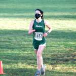 Port Angeles senior cross country runner Kathryn Guttormsen competes at Klahowya on Saturday. It was the first prep sports competition since the COVID-19 pandemic shut down all prep sports last March. (Photos by Rodger Johnson)