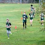 Port Angeles freshman Reid Schmidt leads a pack of Roughrider boys on the Klahowya cross country course Saturday. (Photo by Rodger Johnson)