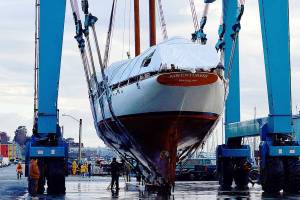 The Adventuress, a 108-year-old National Historic Landmark and nonprofit educational ship, was lifted into the Port Townsend Boat Haven on Monday morning. The schooner will receive its routine Coast Guard hull inspection and have its bottom painted. (Diane Urbani de la Paz/Peninsula Daily News)