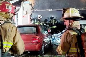 East Jefferson Fire Rescue
Firefighters transition from extinguishing the fire to overhaul.