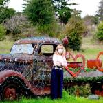 Barber Debbie Hinton of Port Townsends Victorian Clipper barbershop had a vintage truck towed in from Chimacum decades ago, with the intention of planting a garden in it. These days its a changing holiday display festooned in February with Valentines Day decor. (Diane Urbani de la Paz/Peninsula Daily News)