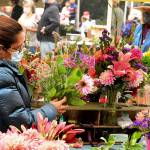 Amie Albaugh of Sequim, seen at the market stand last year, is among the vendors at the Jefferson County Farmers Market. The market invites farmers, chefs and artisans of color to apply for grants from its new startup fund. (Diane Urbani de la Paz/Peninsula Daily News)
