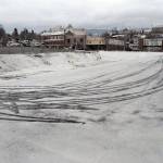 Tire tracks in the snow are present at the site of a future luxury hotel planned by the Lower Elwha Klallam Tribe in downtown Port Angeles. (Keith Thorpe/Peninsula Daily News)