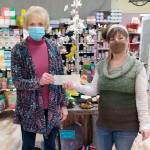Danette Grady, executive director of Peninsula Friends Of Animals, on left, receives a $1,000 donation from Cynthia Tolman.

Tolman is the owner of Best Friend Nutrition: The Natural Pet Market.

According to a press release, the gift will be used to support the friends' mission to spay/neuter, rescue and arrange adoption for homeless, neglected or abused animals.