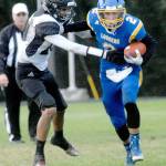 Crescents Brenten Dalton, right, tries to evade Lummi Nations Jaie Leighton during Satudays matchup in Joyce. (Keith Thorpe/Peninsula Daily News)
