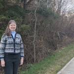 Jaimie Maciejewski, executive director of Habitat for Humanity of East Jefferson County, stands at property destined to be developed for 20 homes on Landes Street in Port Townsend. (Zach Jablonski/Peninsula Daily News)
