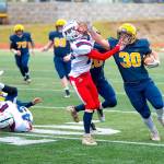 Forks Hayden Baker (30) runs the ball against Pe Ell-Willapa Valley on Saturday. (Eric Trent/Daily Chronicle)