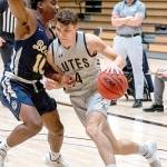 Ally Downey/Pacific Lutheran University Athletics
Pacific Lutheran guard Grayson Peet drives during a game earlier this season. The 2017 Port Angeles grad sank two 3-point baskets in a win over rival Puget Sound on Saturday.