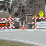Barricades block a section of Race Street at Park Avenue in Port Angeles as a crew trims trees on Tuesday. (Keith Thorpe/Peninsula Daily News)