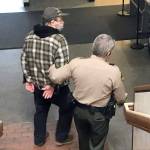 David Allen of Forks is led away to the Clallam County jail Wednesday to await sentencing after pleading guilty to two counts of child rape. (Paul Gottlieb/Peninsula Daily News)