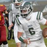 Keith Thorpe/Peninsula Daily News
Port Angeles' Jaziel Livingston rushes for yardage while pursued by Kingston's Lief Nelson, left, and teammate Jake Jacobsen on Saturday at Stevens Middle School.