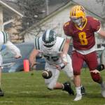 Port Angeles Treyton Walde, center, dives for a ball dropped by Kingstons Daniel Afton as Waldes teammates, Cyras Mills, left, and Aaron Edmiston, right, follow suit on Saturday at Stevens Middle School. (Keith Thorpe/Peninsula Daily News)
