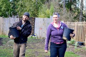Ashley Kehl, left, and his wife Jennimae Hillyard will host the 10th annual Plant & Seed Exchange in Port Townsend on Sunday. (Diane Urbani de la Paz/Peninsula Daily News)