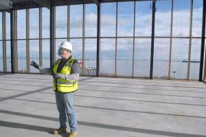 Chris Fidler, executive director of the Field Arts and Events Hall, stands in what will be a conference area during a tour of the Port Angeles facility on Friday. (Keith Thorpe/Peninsula Daily News)