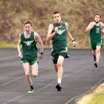Port Angeles Roughriders finish the 3,000-meter race at the Roughriders track and field jamboree Saturday with Klahowya. From left are Langdon Larson, Port Angeles (10:12.94), Maxwell Baeder, Port Angeles (10:12.85) and Evan Hagle, Klahowya (10:19.75). (Photo courtesy of Loren Larson)