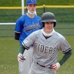 Port Angeles' Landon Seibel rounds second past East Jefferson's Ryan Popp after Seibel hamnered a bases loaded homer in the third inning on Tuesday at Port Angeles Civic Field.