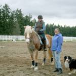 After retiring in June last year, Amy Greenbaum, on BelClaire, became a working student  someone who does barn chores  for Fédération Équestre Internationale competitor, trainer and instructor Becky Cushman with Casey at Paradigm Sporthorse in Port Townsend. (Karen Griffiths/for Peninsula Daily News)