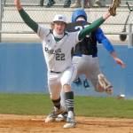 Port Angeles first baseman John Vaara holds his hands up after beating out North Mason batter Mason Schumaker in the first inning on Satiurday at Civic Field in Port Angeles. (Keith Thorpe/Peninsula Daily News)