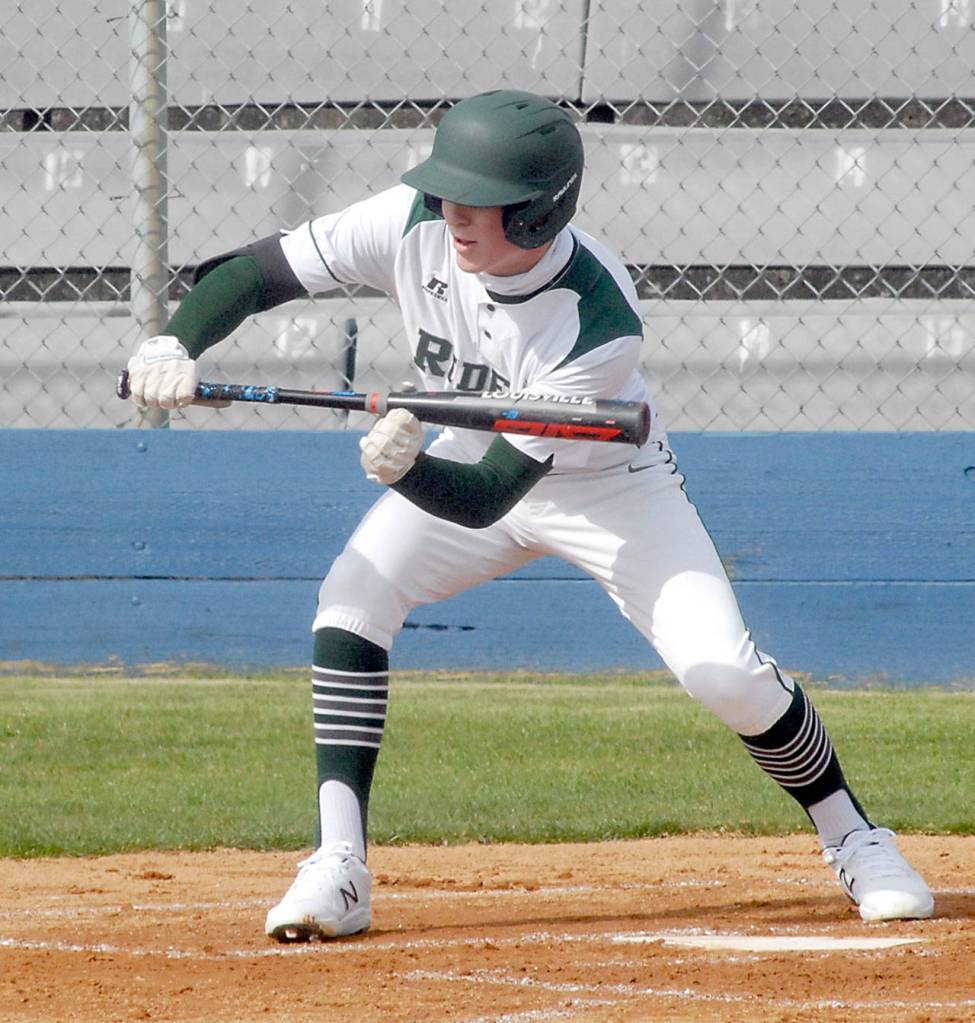 Port Angeles Wyatt Hall attempts to bunt in his opening at-bat against North Mason on Saturday at Civic Field in Port Angeles. (Keith Thorpe/Peninsula Daily News)