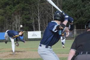 Spartan pitcher Carter Windle delivers the pitch to a NW Christian batter Friday afternoon at Fred Orr Field in Beaver where Forks defeated the Wolverines.  Photo by  Lonnie Archibald.

In case you need the name of the batter in which Windle is pitching to it is  Cooper Walker.  Lonnie.