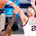 Creighton forward Damien Jefferson (23) and Gonzaga forward Drew Timme (2) battle for a loose ball in the second half of a Sweet 16 game in the NCAA men's college basketball tournament at Hinkle Fieldhouse in Indianapolis, Sunday, March 28, 2021. (AP Photo/AJ Mast)