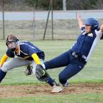 Spartan Elizabeth Soto steals second during the second game of a double header won by Forks 6 to 0.  Covering is Ilwaco short stop Justyce Patana.  Photo by Lonnie Archibald.