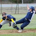 Spartan Elizabeth Soto steals second during the second game of a double header won by Forks 6 to 0. Covering is Ilwaco short stop Justyce Patana. (Photo by Lonnie Archibald.)