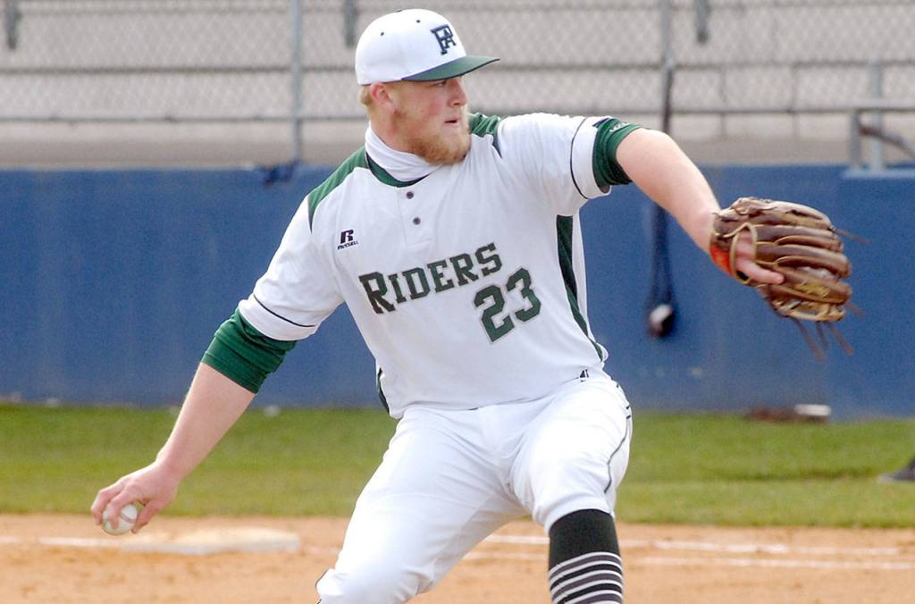 Keith Thorpe/Peninsula Daily News Port Angeles pitcher Adam Watkins throws in the first inning against Olympic on Friday.