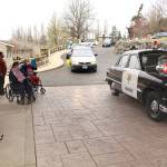 Local law enforcement, first responders, and friends and family of Lorraine Hansen drove through waving and wishing her well Friday morning at the Port Townsend Life Care Center in honor of her 104th birthday on Saturday, April 3, 2021. (Zach Jablonski/Peninsula Daily News)
