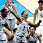 Gonzaga guard Jalen Suggs (1) celebrates making the game winning basket against UCLA during overtime in a mens Final Four NCAA college basketball tournament semifinal game, Saturday, April 3, 2021, at Lucas Oil Stadium in Indianapolis. Gonzaga won 93-90. (AP Photo/Michael Conroy)
