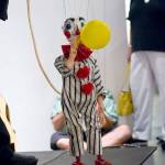 Puppeteer Fred Michaels marionettes will entertain passers-by at Port Townsends Pope Marine Plaza this Saturday. (photo courtesy Port Townsend Main Street Program)