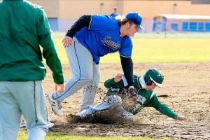 Steve Mullensky/for Peninsula Daily News

East Jefferson's Chris Fair gets the out at 3rd on Port Angeles' Michael Soule during a game played Thursday in Chimacum.