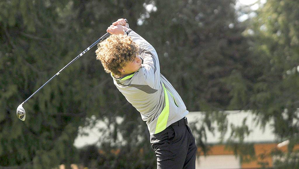 Sequims Dom Riccobene drives the ball in a match Thursday against East Jefferson at Cedars at Dungeness. Riccobene shot in the 30s and helped lead his team to a 166-210 win. (Michael Dashiell/Olympic Peninsula News Group)