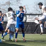 Jesse Major/for Peninsula Daily News
Peninsula defender Dylan Pauw, right, heads the ball toward the goal in front of a tangle of Edmonds players and teammate Juan Hernandez during the Pirates' 5-1 season-opening win Monday at Wally Sigmar Field.