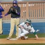 Port Angeles Michael Soule makes it safely to third as Sequim third baseman Ricky Jennings looks on in the second inning on Wednesday at Port Angeles Civic Field. (Keith Thorpe/Peninsula Daily News)